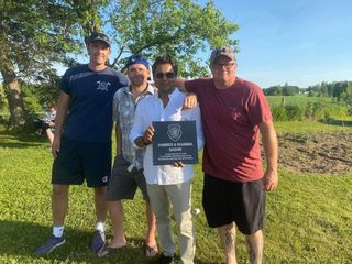 Bashir Ahmmed receiving recognition from the Mulmur-Melancthon Fire Department.